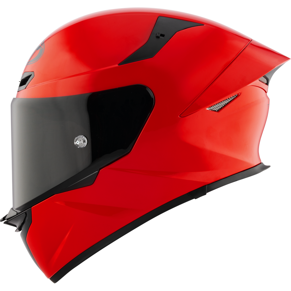 Red motorcycle helmet with a black visor on a white background