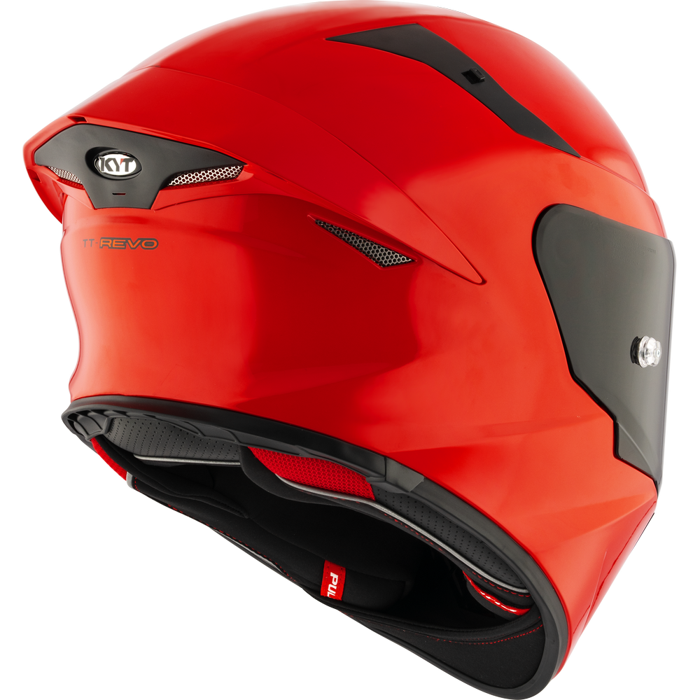 Red motorcycle helmet with black accents on a white background