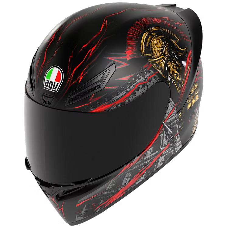 Black motorcycle helmet with red and gold design on a white background