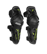 Black knee pads with green accents and 'Rynox' branding on a white background