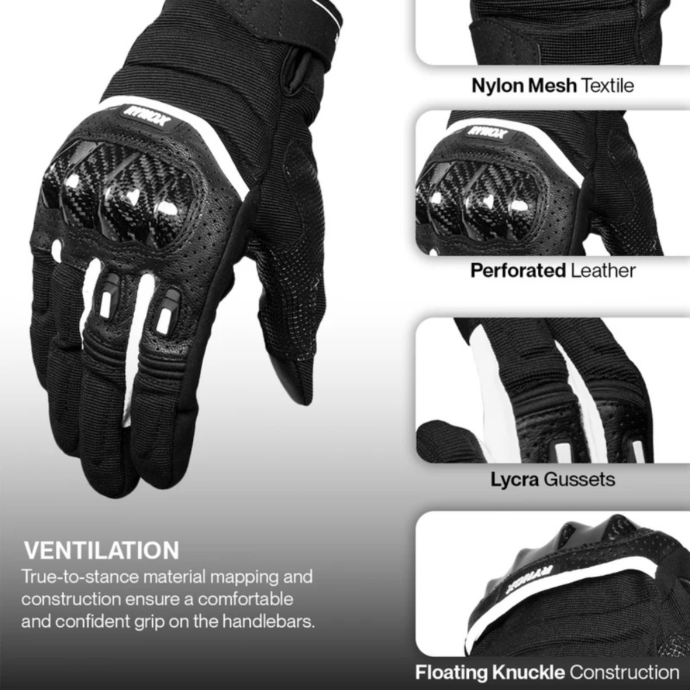 Black motorcycle riding gloves with white accents and carbon fiber knuckle protection, shown with feature callout panels explaining nylon mesh textile, perforated leather, Lycra Gussets, and floating knuckle construction.