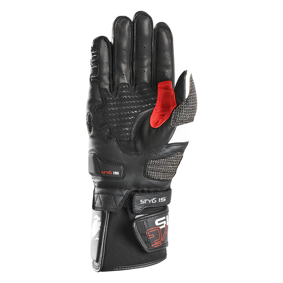 Black motorcycle glove with red accents on a white background