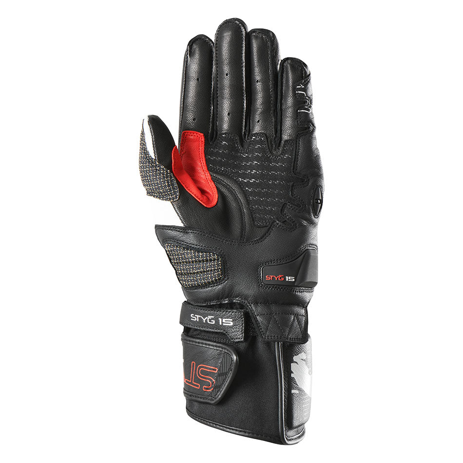 Black motorcycle glove with red accents on a white background