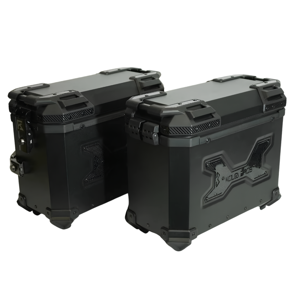 Kolga Bros Carbon Moto side cases fitted to a motorcycle rack for long-distance touring