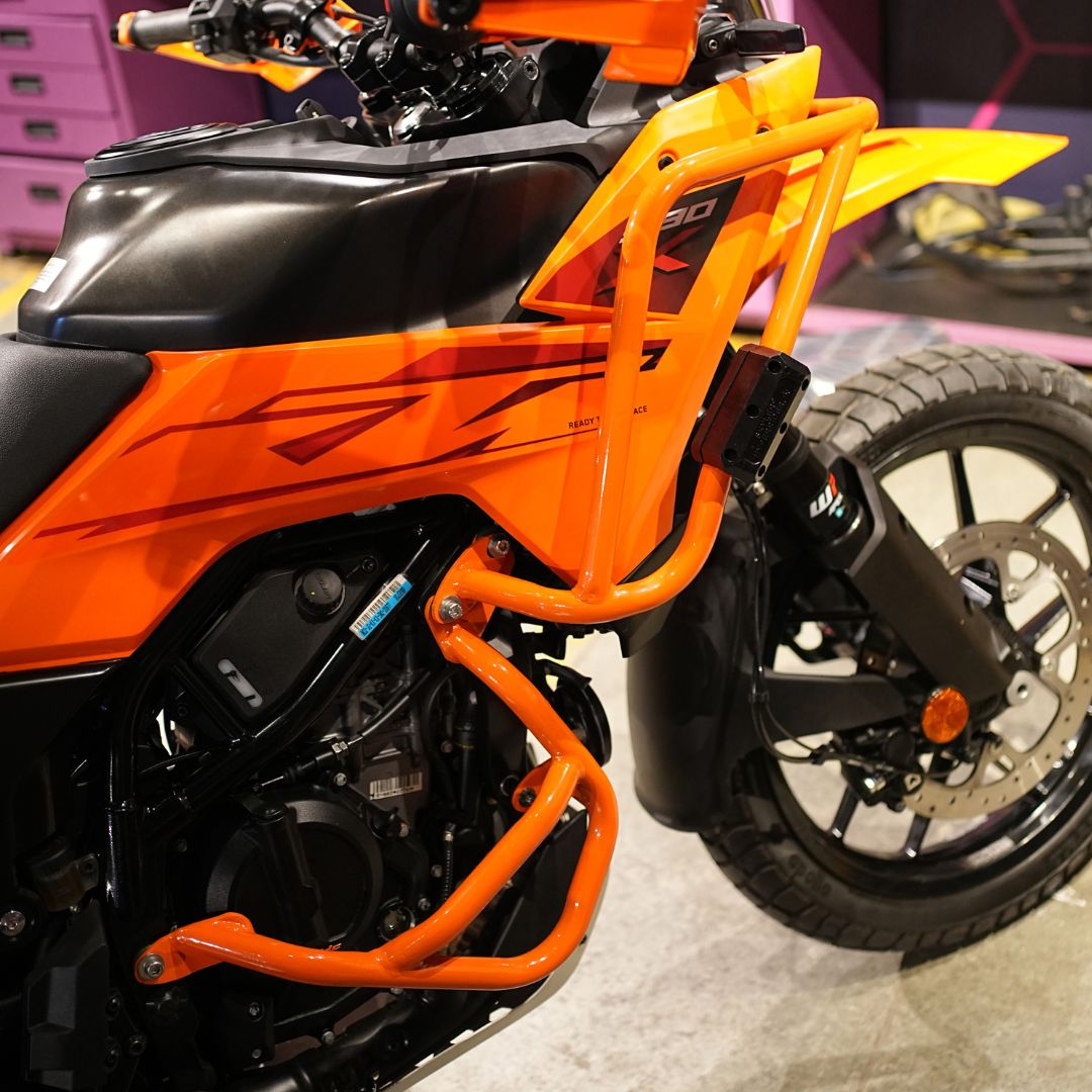 KTM X-ADV crash guard in bright orange offering rugged protection