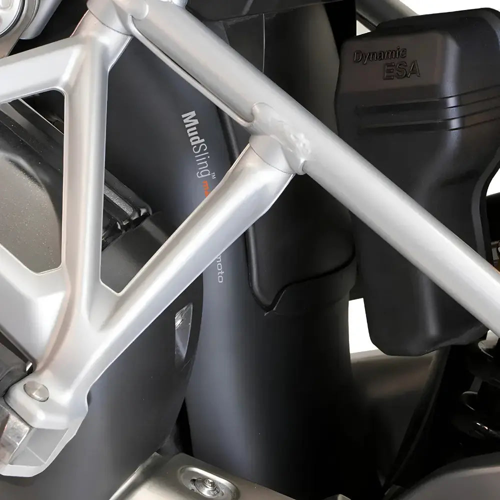 MachineartMoto MudSling R/RS polypropylene rear suspension guard with 8.5 × 16-inch coverage area.
