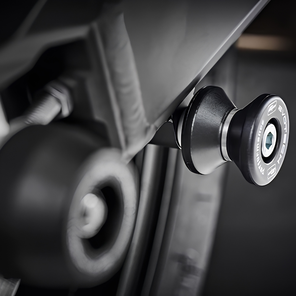 Evotech Kawasaki Z900RS 2026+ Paddock Stand Bobbins installed on rear swingarm