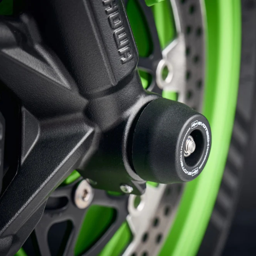 Evotech fork sliders mounted through the front wheel spindle on Ninja ZX-6R
