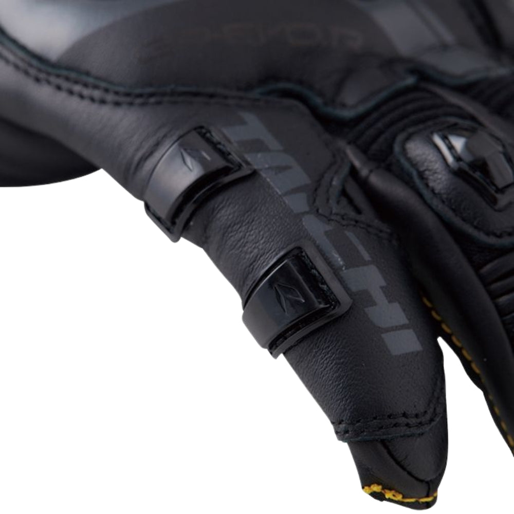 Close-up of a black motorcycle glove with brand logo on a white background