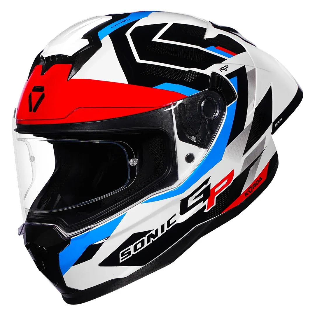Korda Sonic GP Flash Helmet in Gloss White Red Blue – worn by rider on motorcycle